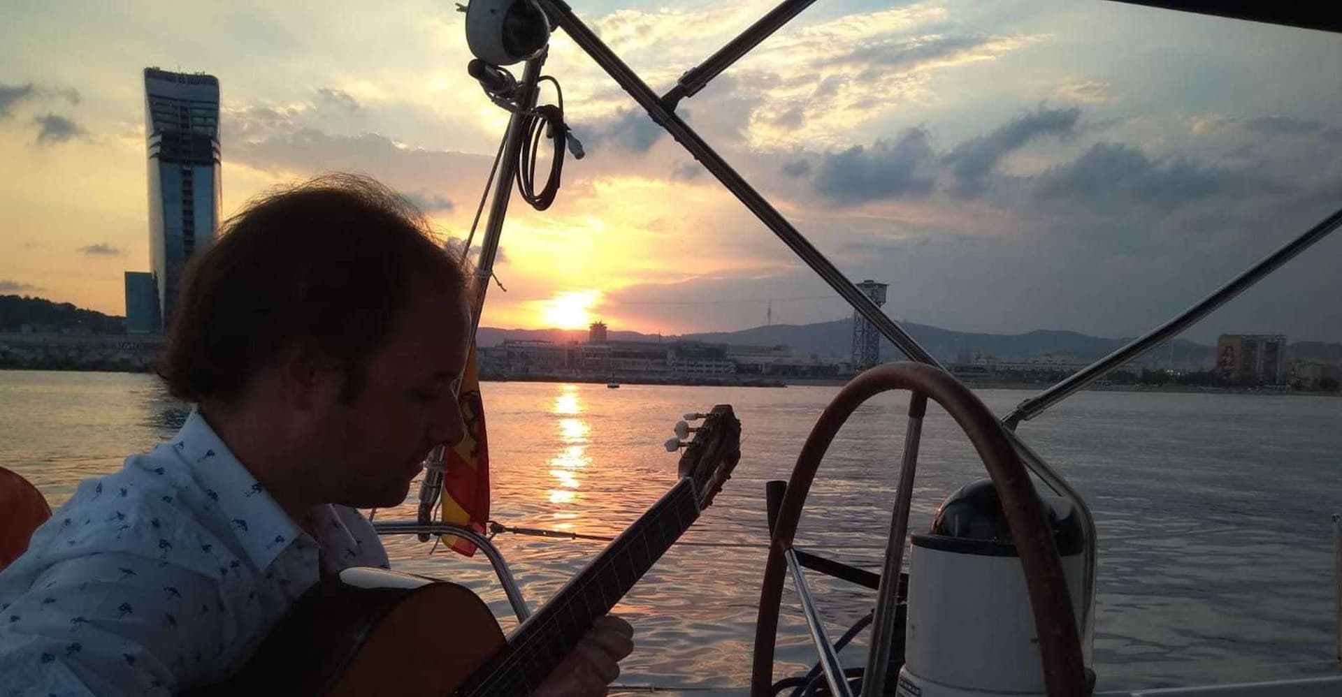 Barcelona: Sunset Sailing with Live Guitar Music and Tapas photo 1