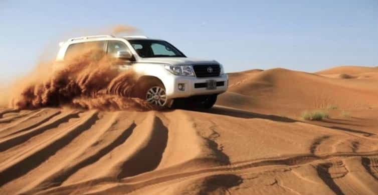 Doha: Desert Safari Dune Bashing, Sandboarding, & Camel Ride